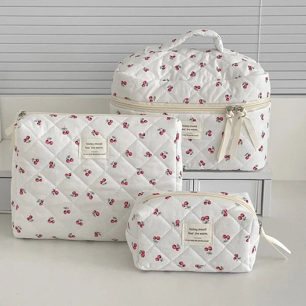 1PC Pink Strawberry Women Cosmetic Quilted Bag showcasing three sizes with quilted design and cherry patterns.