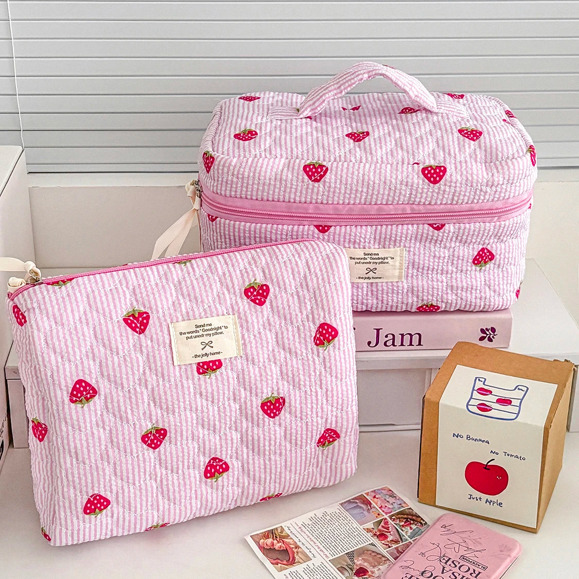 1PC Pink Strawberry Women Cosmetic Quilted Bag set with two cases in pink fabric with strawberry print.