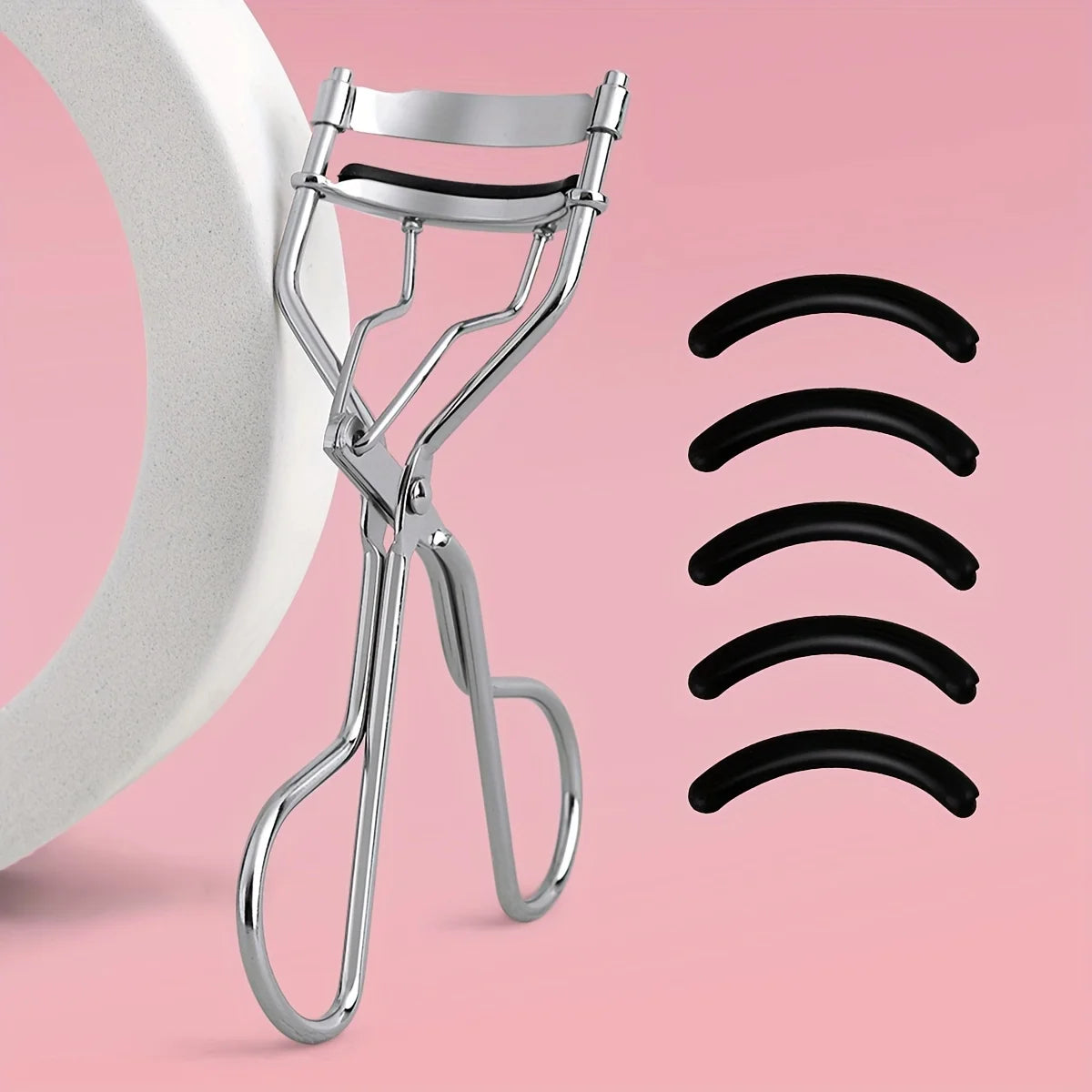 1 portable eyelash curler with 5 silicone pads