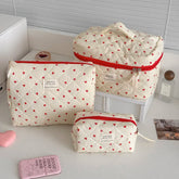 1PC Pink Strawberry Women Cosmetic Quilted Bag displayed with multiple sizes and heart patterns.