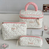 1PC Pink Strawberry Women Cosmetic Quilted Bag in floral design with pink accents and handle.